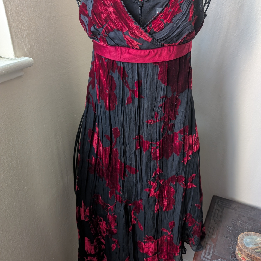 Bebe "B" Beautiful in this smooth chic halter dress. Fully lined.-